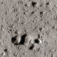 NEAR close-up of asteroid Eros showing rocks on the surface