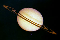 Pioneer image of the planet Saturn and its moon Titan